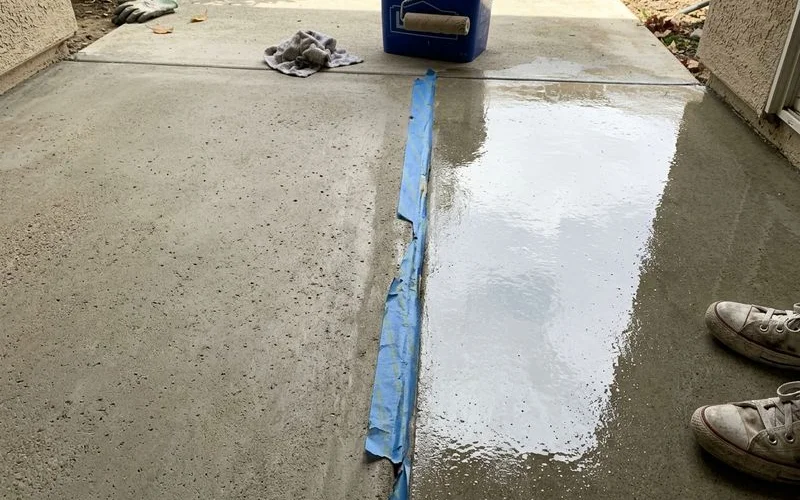 Side-by-side comparison of matte and glossy sealed concrete surfaces